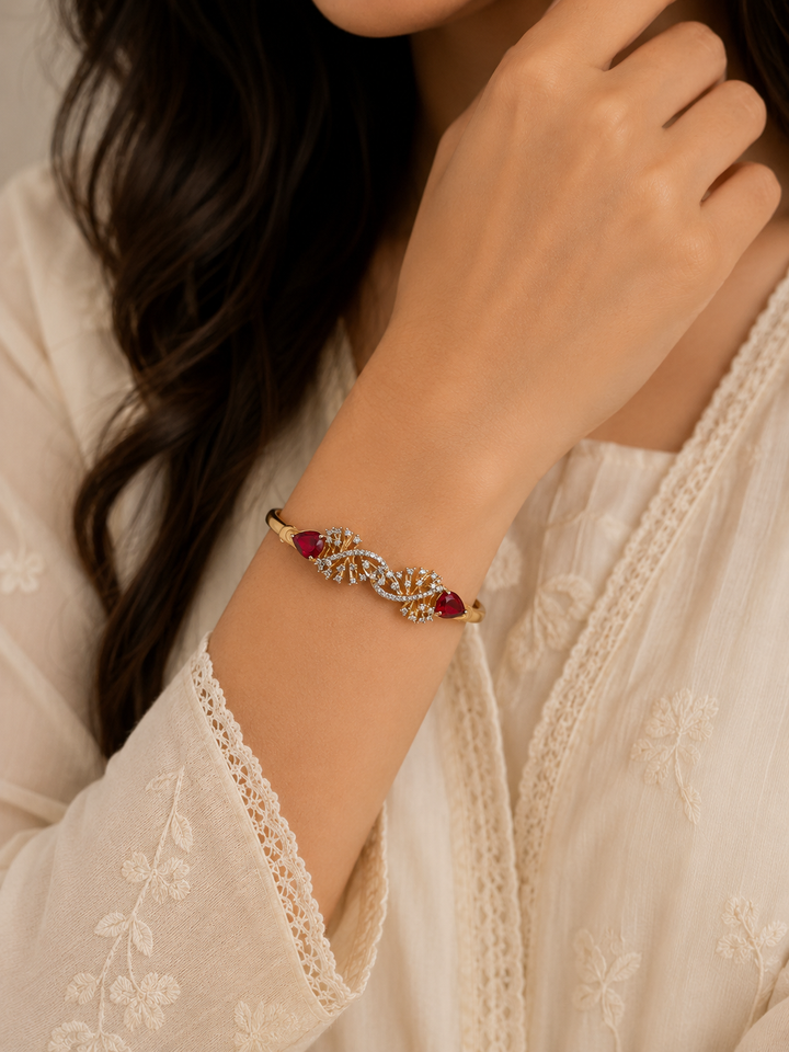 Ruby Bloom Twist Open Bracelet (Kara) – Gold Plated with Ruby Red Stones